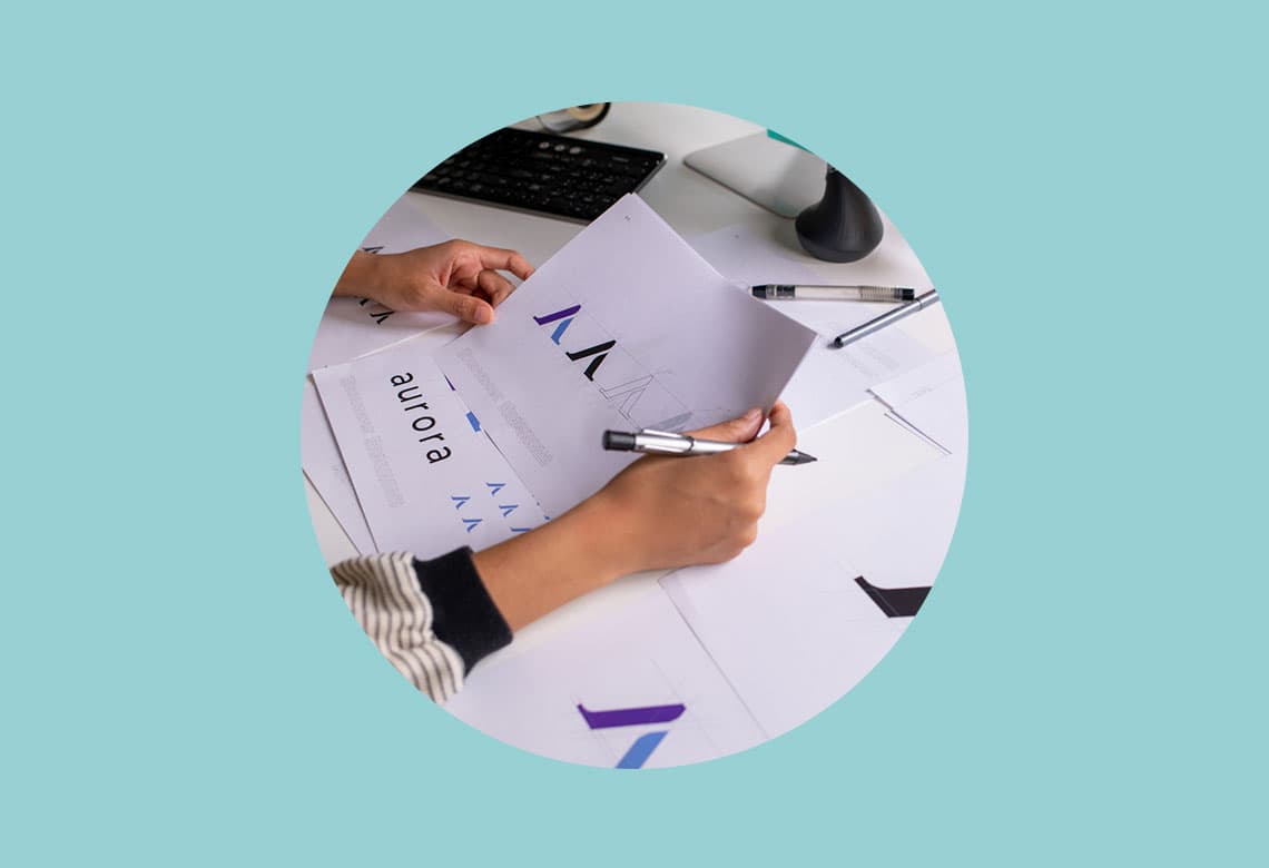 agency graphic designer working on logo concepts for client